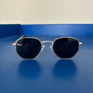 Black and gold hexagon sunglasses